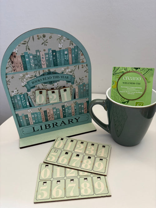 Box avec compteur de livres et goodies 💚
